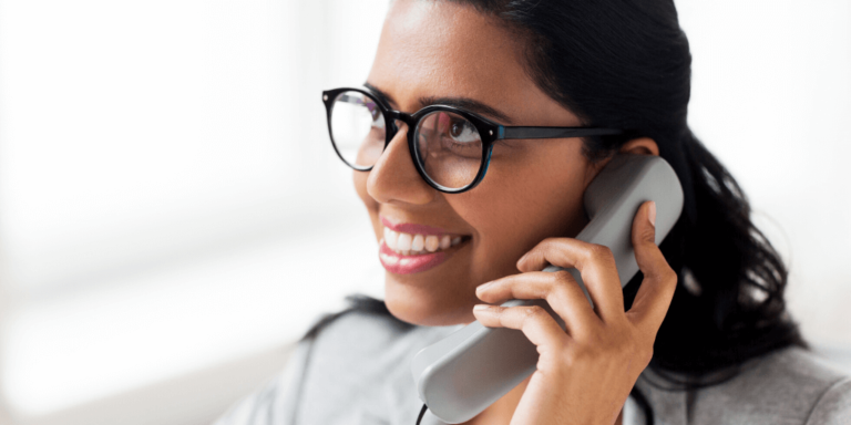 Lady smiling during her telephone job interview