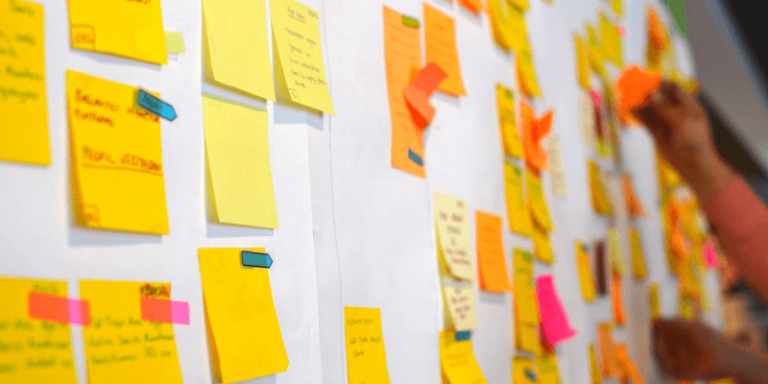 Agile vs waterfall? Both commonly involve many sticky notes on a whiteboard but which one is best for your career?