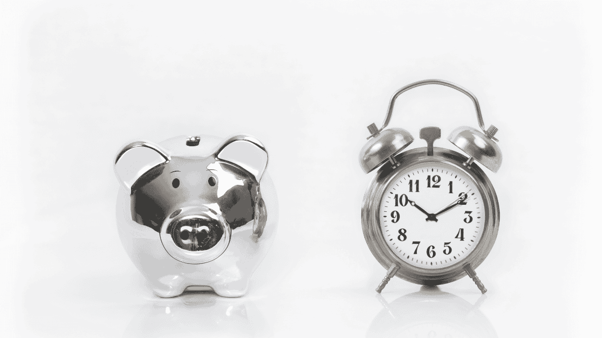 Silver pig and clock representing time vs money; is it worth wasting your time on recruitment?