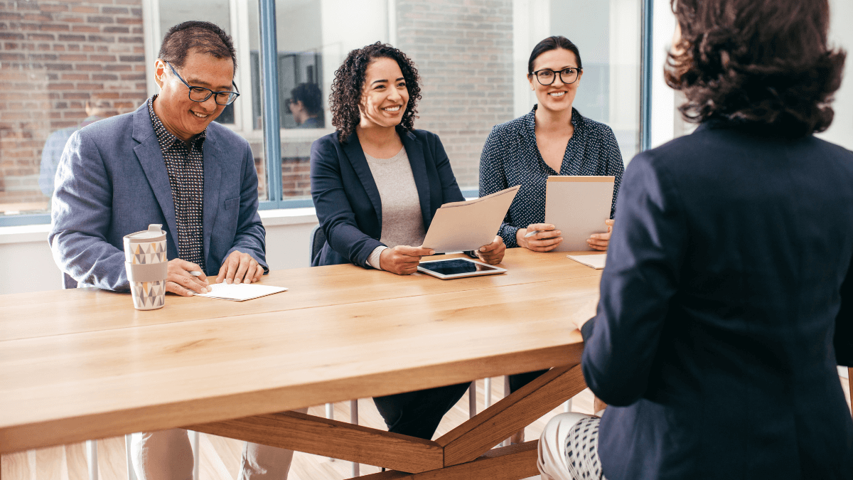 Candidate acing her interview after preparing answers to the most commonly asked job interview questions