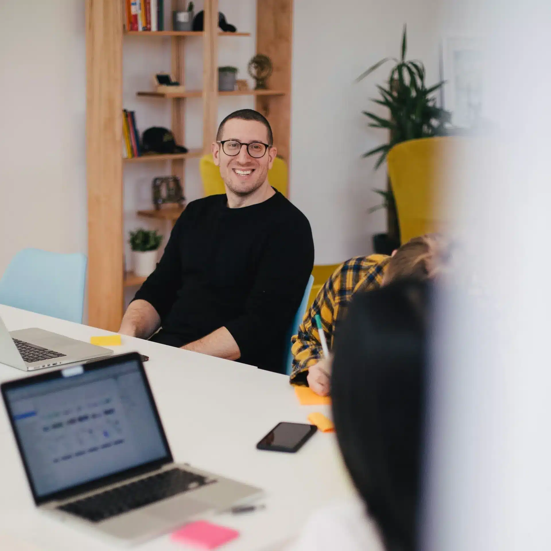 Man sitting on his desk at a digital agency