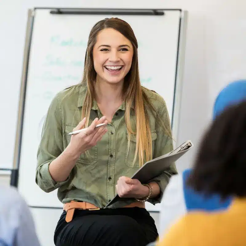 A woman smiles after getting good positive feedback her campaign results